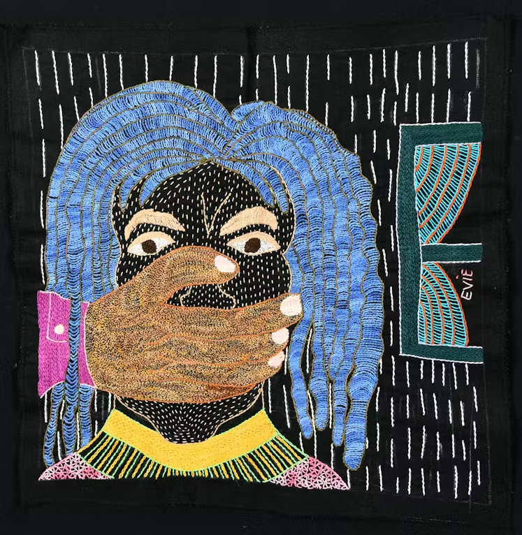 embroidery of women with her mouth covered with hand