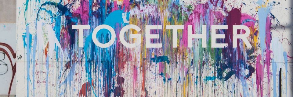 the word together on a colourful background