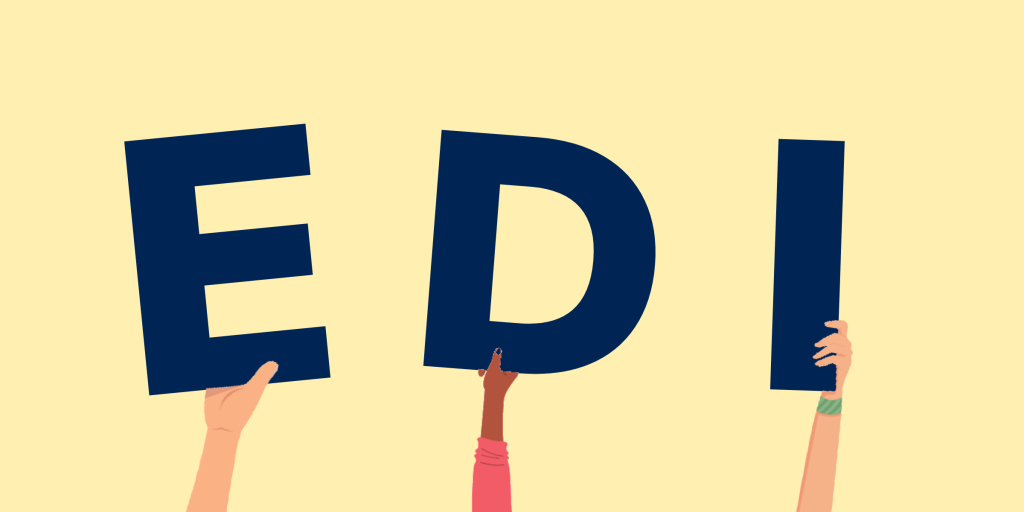 Three hands hold the letters EDI