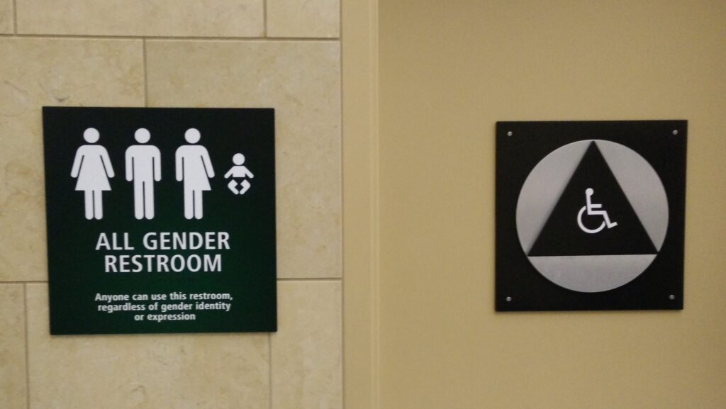 A photograph of an all gender and disabled restroom